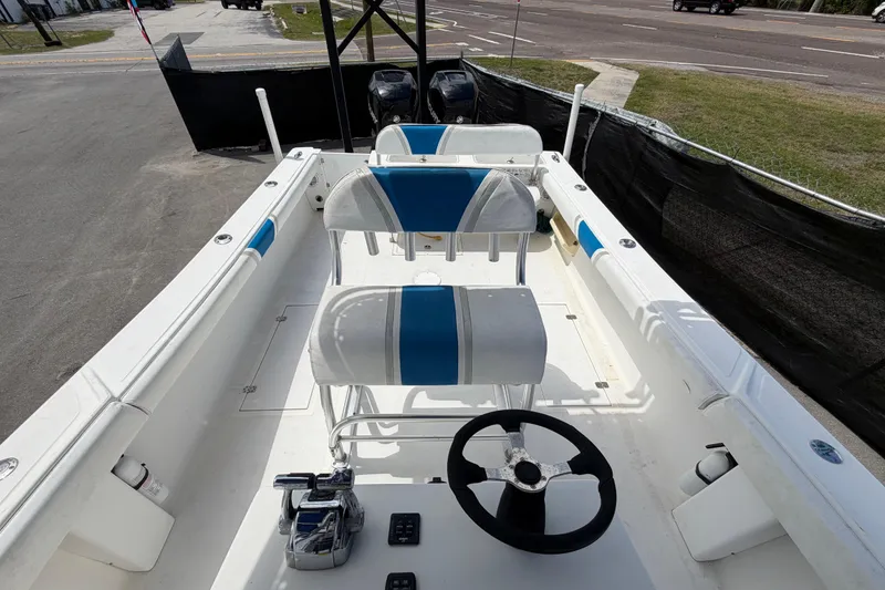 Slide: The Image of 2006 Ocean Runner 2900 C/C Open Fisherman boat interior with dual seats and steering wheel. - 56