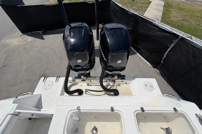 Slide: The Image of 2006 Ocean Runner 2900 C/C Open Fisherman with dual Mercury outboard engines. - 61