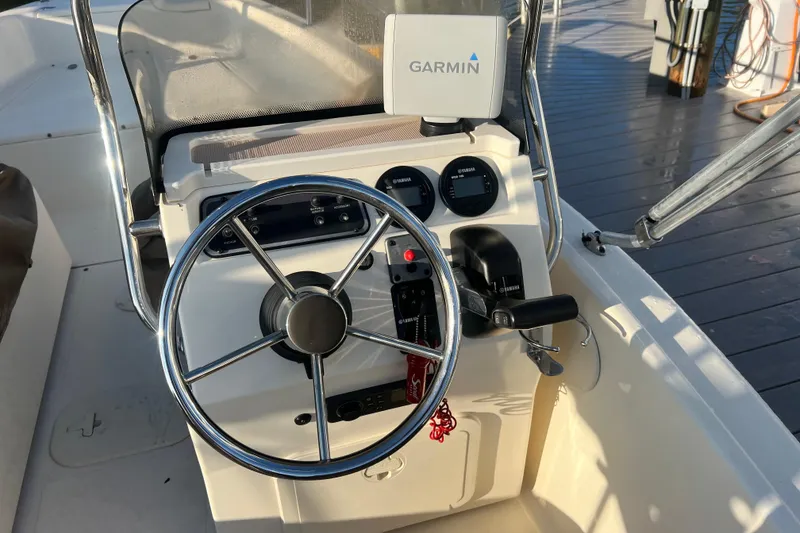 Slide: The Image of 2018 Scout 175 Sport Dorado boat helm with Garmin navigation system. - 5