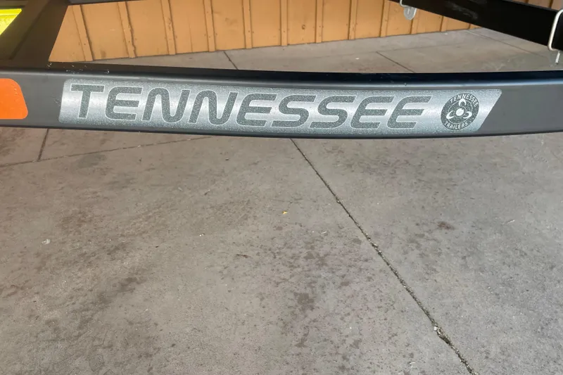 Slide: The Image of Trailer with "Tennessee" branding for 2026 Reaper Boats 553 Timber Reaper. - 15
