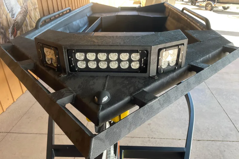 Slide: The Image of 2026 Reaper Boats 553 Timber Reaper with LED lights, showcasing rugged design and durability. - 2