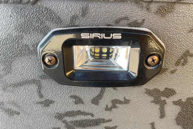 Slide: The Image of Close-up of Sirius LED light on 2026 Reaper Boats 553 Timber Reaper. - 8