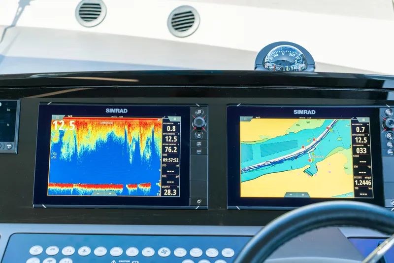 Slide: The Image of Simrad navigation displays on 2018 Sunseeker Manhattan 52 yacht dashboard. - 28