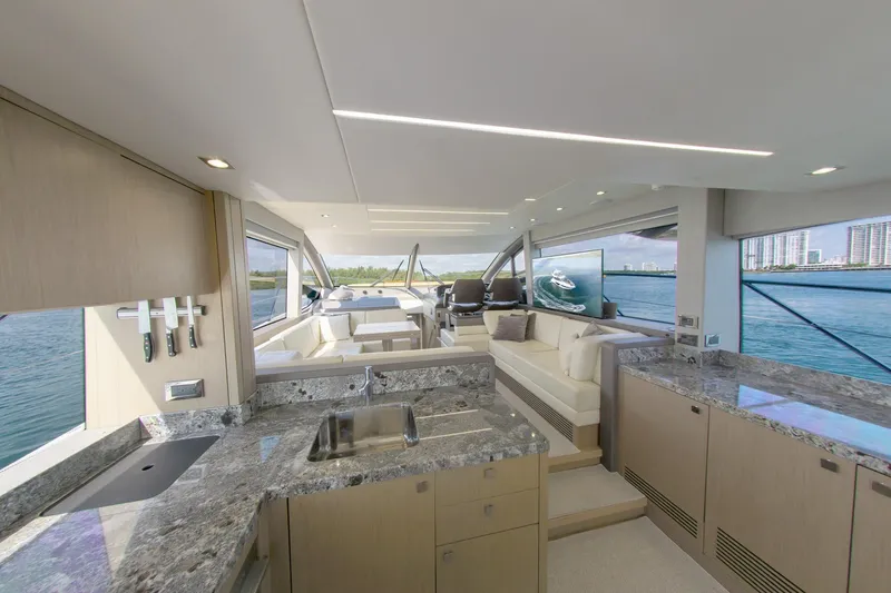Slide: The Image of Luxurious interior of 2018 Sunseeker Manhattan 52 yacht with modern kitchen and seating area. - 34
