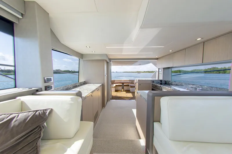 Slide: The Image of Luxurious interior of 2018 Sunseeker Manhattan 52 yacht with panoramic water views. - 41