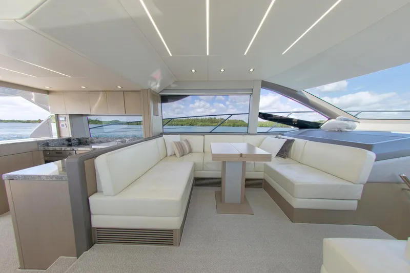 Slide: The Image of Luxurious interior of 2018 Sunseeker Manhattan 52 yacht with elegant seating and panoramic views. - 45