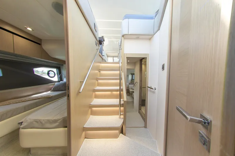 Slide: The Image of Luxurious interior of 2018 Sunseeker Manhattan 52 yacht with modern staircase and cabin. - 56
