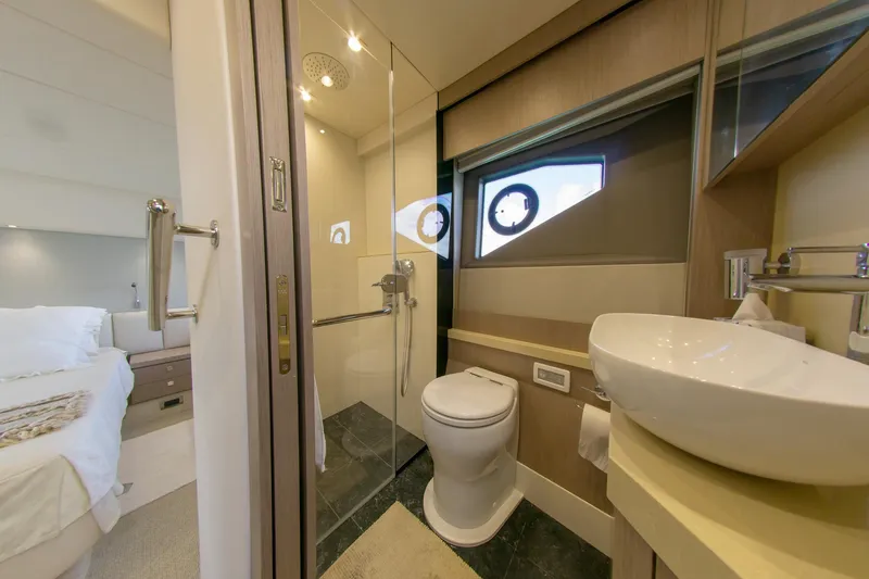 Slide: The Image of Luxurious bathroom interior of 2018 Sunseeker Manhattan 52 yacht, featuring modern fixtures and elegant design. - 57
