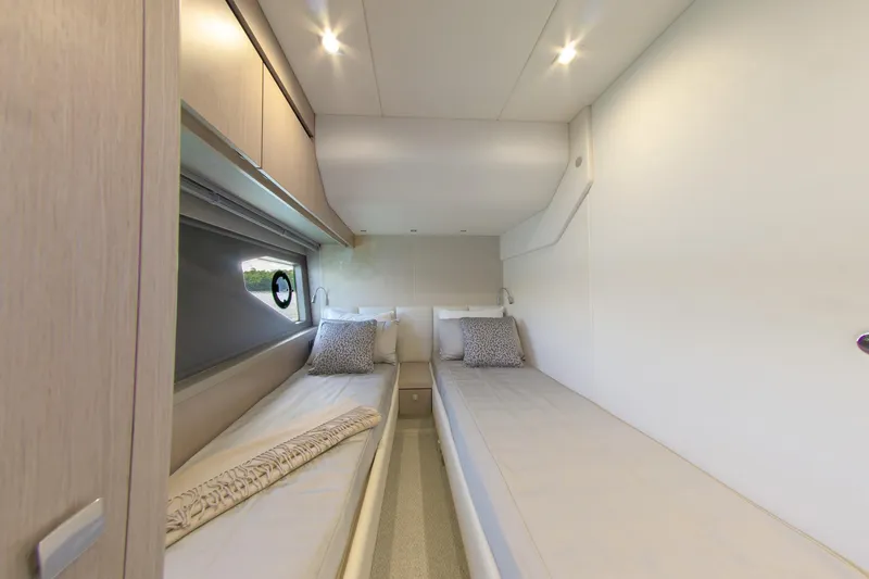 Slide: The Image of Luxurious twin cabin interior of 2018 Sunseeker Manhattan 52 yacht. - 59