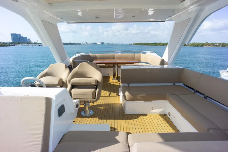Slide: The Image of Luxurious 2018 Sunseeker Manhattan 52 yacht interior with spacious seating and ocean view. - 69