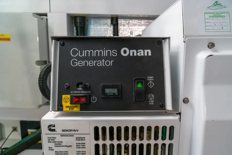 Slide: The Image of Cummins Onan generator control panel on 2018 Sunseeker Manhattan 52 yacht. - 84