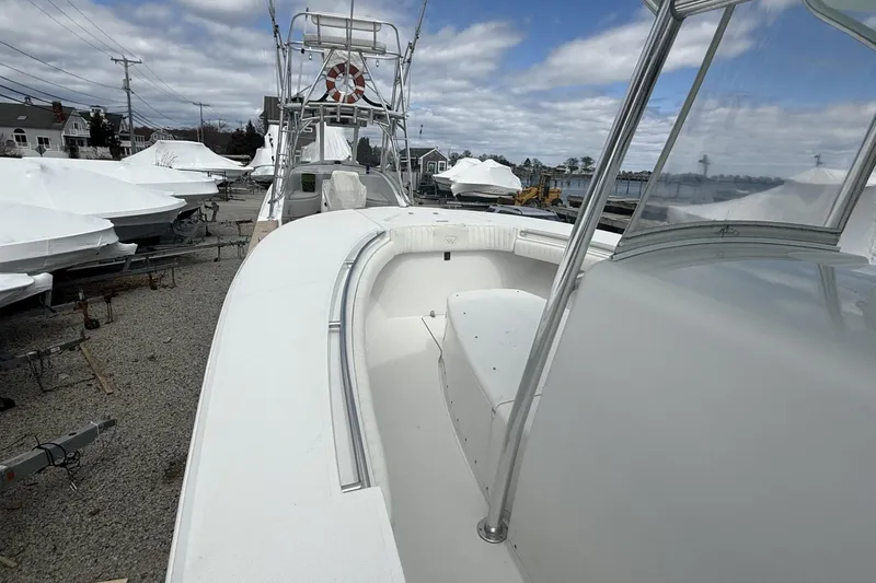 Slide: The Image of 2012 Southport 29 Tournament Edition boat on display, surrounded by covered boats. - 12