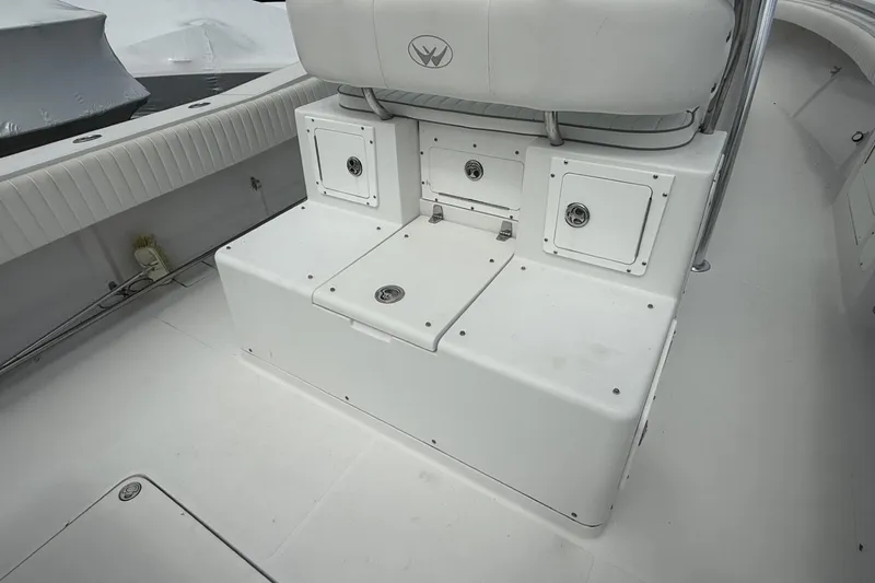 Slide: The Image of 2012 Southport 29 Tournament Edition boat interior with storage compartments and seating. - 15