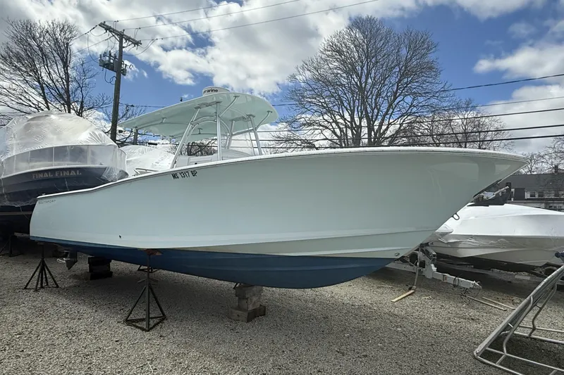 Slide: The Image of 2012 Southport 29 Tournament Edition boat on display outdoors. - 23