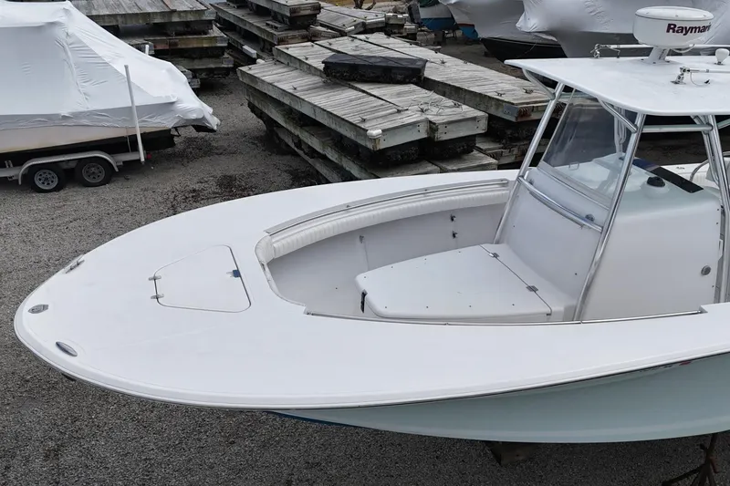 Slide: The Image of 2012 Southport 29 Tournament Edition boat docked, featuring a sleek white design. - 4