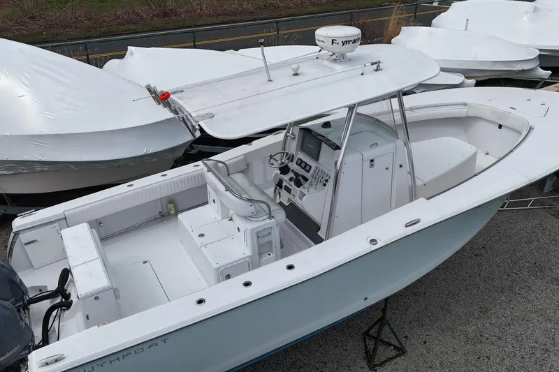 Slide: The Image of 2012 Southport 29 Tournament Edition boat with center console and spacious deck. - 5