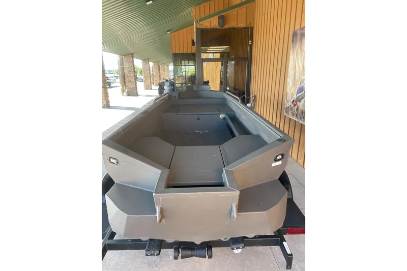 Slide: The Image of 2026 Reaper Boats 550 Timber Reaper, sleek design, outdoor display, modern features. - 11