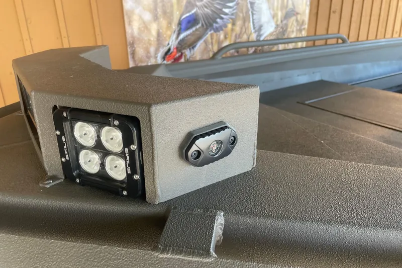 Slide: The Image of Close-up of 2026 Reaper Boats 550 Timber Reaper's LED light detail. - 6