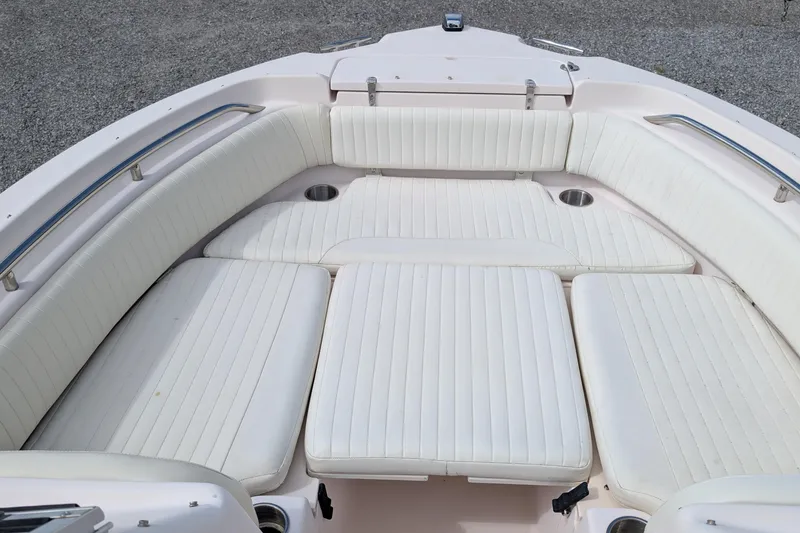 Slide: The Image of 2007 Grady-White Tournament 225 boat with spacious white seating area. - 6