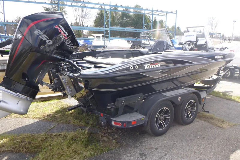 Slide: The Image of 2019 Triton 206 Allure boat with Mercury Pro XS 250 engine on trailer. - 3