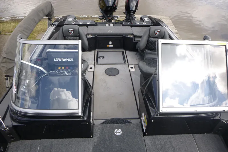 Slide: The Image of 2019 Triton 206 Allure boat interior with Lowrance electronics and dual seating. - 6