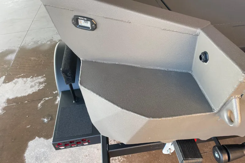 Slide: The Image of 2026 Reaper Boats 553 Timber Reaper, detailed view of boat's rear section and components. - 6