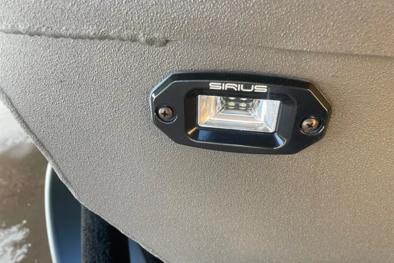 Slide: The Image of Close-up of Sirius light on 2026 Reaper Boats 553 Timber Reaper. - 7