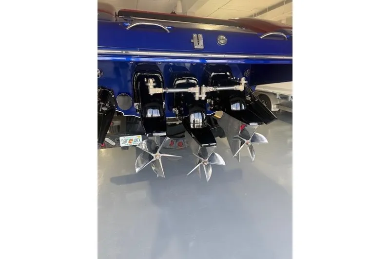 Slide: The Image of Rear view of a 2007 Nor-Tech 5000V boat with multiple propellers. - 6