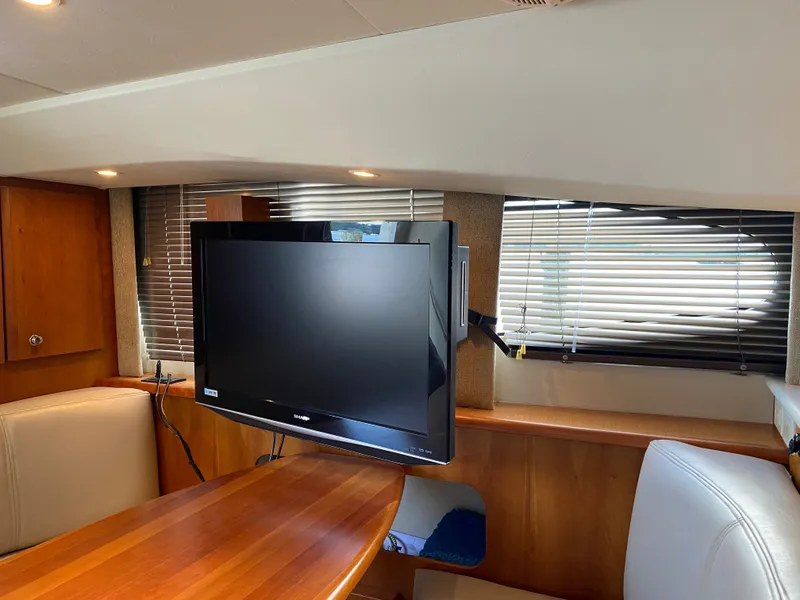 Slide: The Image of Interior of a 2002 Silverton 330 yacht with TV. - 18