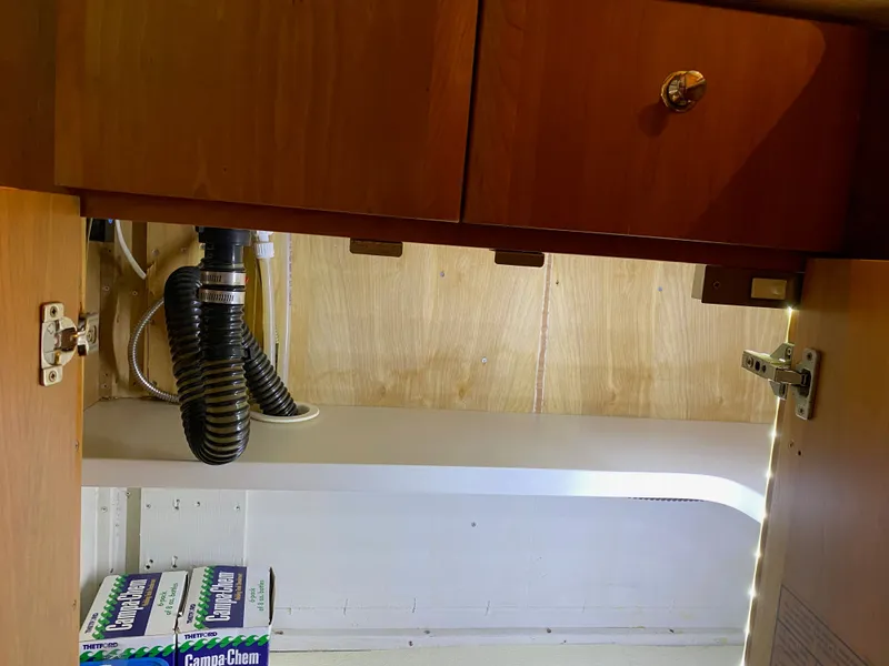 Slide: The Image of Lower cabinet in 2002 Silverton 330 boat. - 35