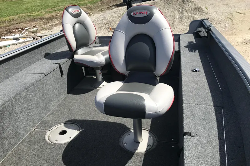 Slide: The Image of 2007 Lund 1425 Classic Tiller boat interior with two cushioned seats. - 8