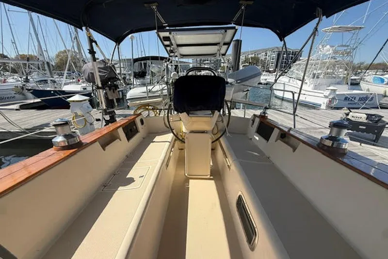 Slide: The Image of Cockpit view of 2001 Island Packet 380 sailboat docked at marina. - 16