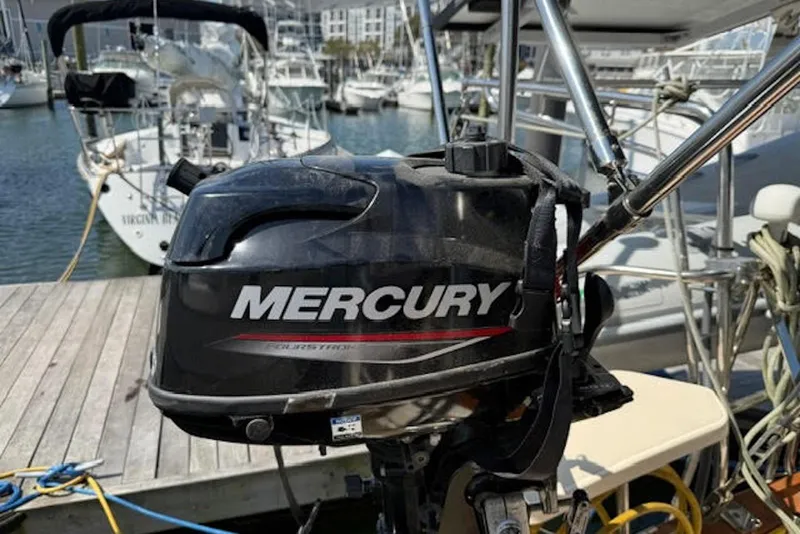 Slide: The Image of Mercury outboard motor on Island Packet 380 sailboat, docked at marina, 2001 model. - 17