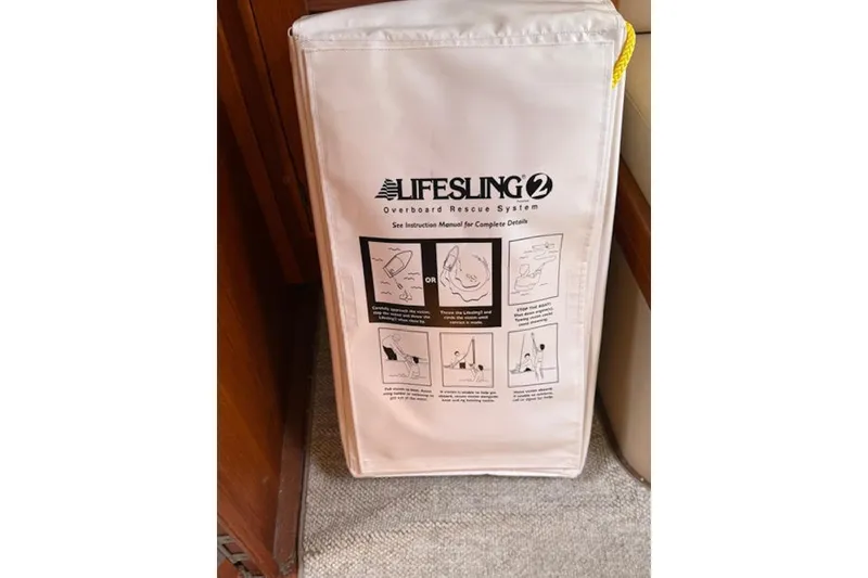 Slide: The Image of Lifesling 2 overboard rescue system on 2001 Island Packet 380 yacht. - 44