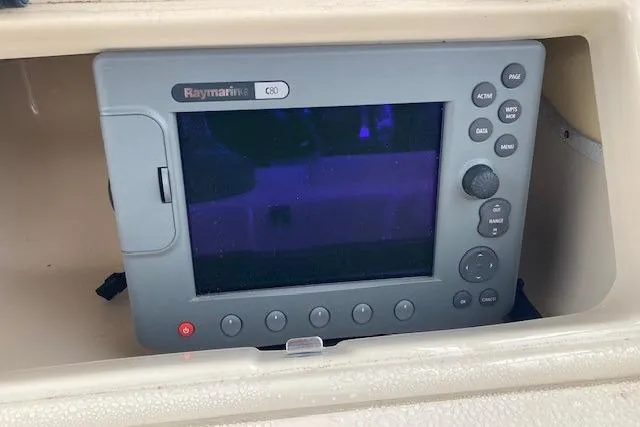 Slide: The Image of Raymarine C80 marine display on 2006 Grady White SEAFARER boat dashboard. - 13