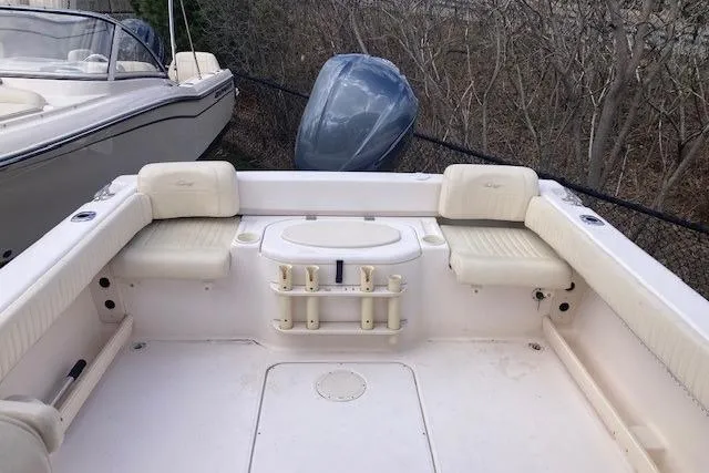 Slide: The Image of 2006 Grady White SEAFARER boat interior with seating and rod holders. - 4