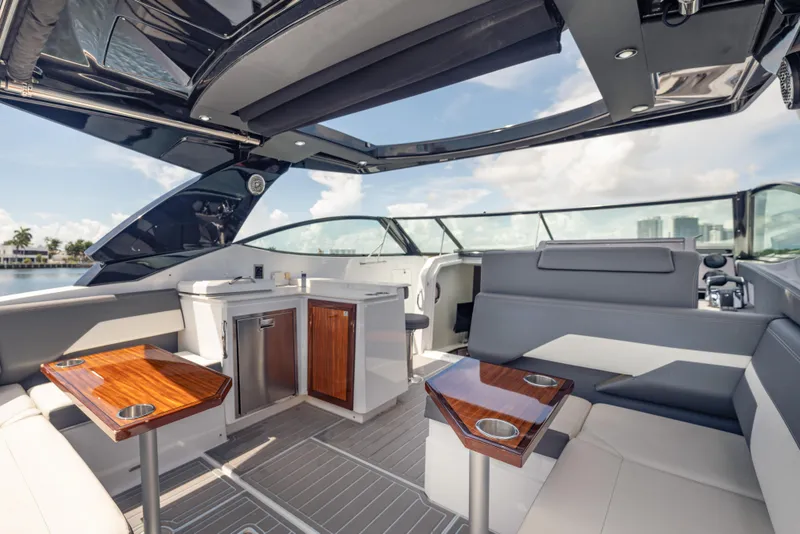 Slide: The Image of Luxurious interior of 2021 Cruisers Yachts 38 GLS with sleek seating and modern amenities. - 29