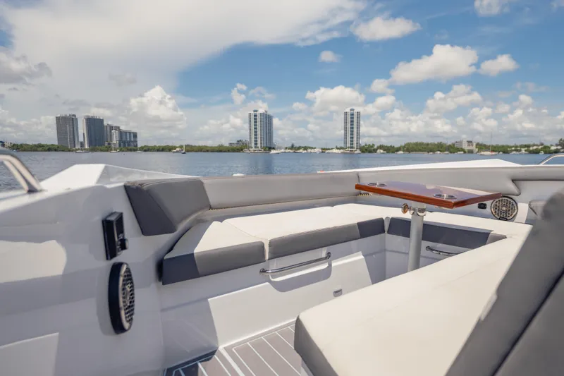 Slide: The Image of Luxurious 2021 Cruisers Yachts 38 GLS interior with waterfront cityscape view. - 43