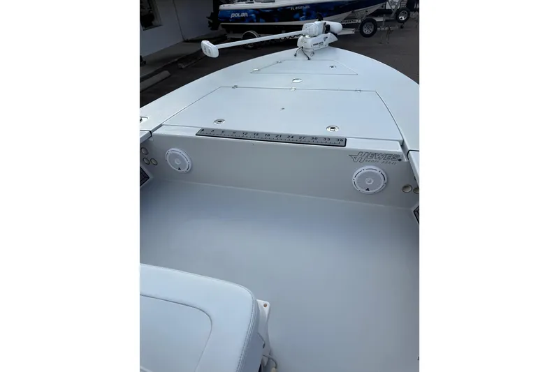 Slide: The Image of 2023 Hewes Redfisher 21 boat deck with speakers and measurement scale. - 11