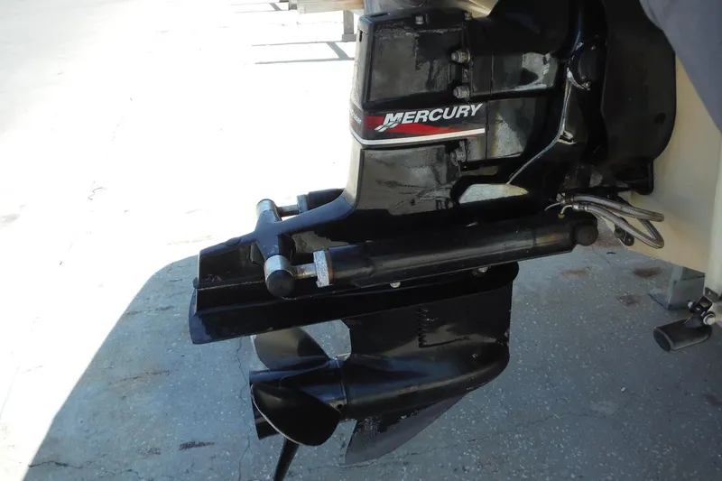Slide: The Image of Mercury outboard motor on a 2004 Sea Ray 180 Sport boat. - 21