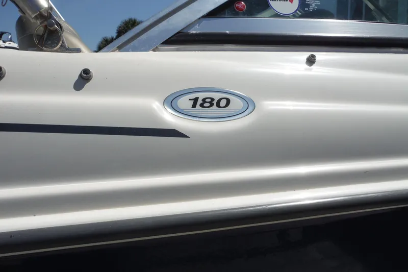 Slide: The Image of Close-up of 2004 Sea Ray 180 Sport boat emblem and side detail. - 5