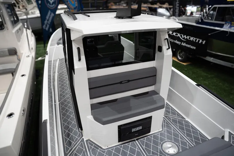 Slide: The Image of 2026 Iron 907 Coupe boat interior with modern seating and sleek design. - 1