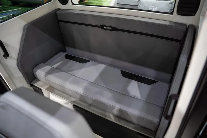 Slide: The Image of 2026 Iron 907 Coupe interior seating with sleek, modern design and gray upholstery. - 10