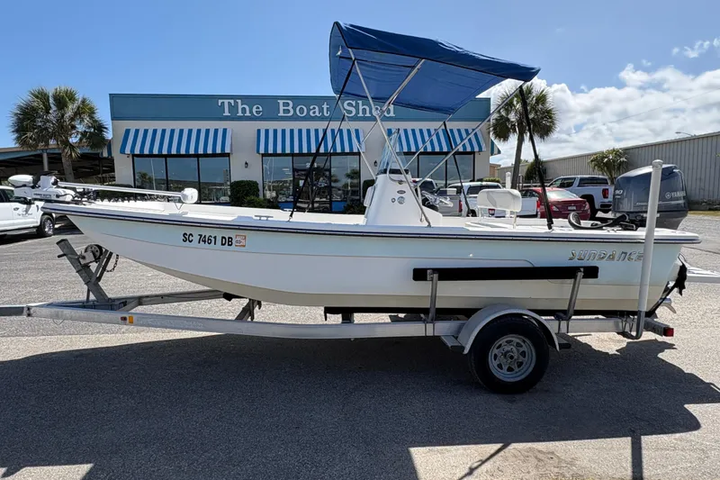 The Image of 2014 Sundance B20CCR boat on trailer outside The Boat Shed dealership. - 0