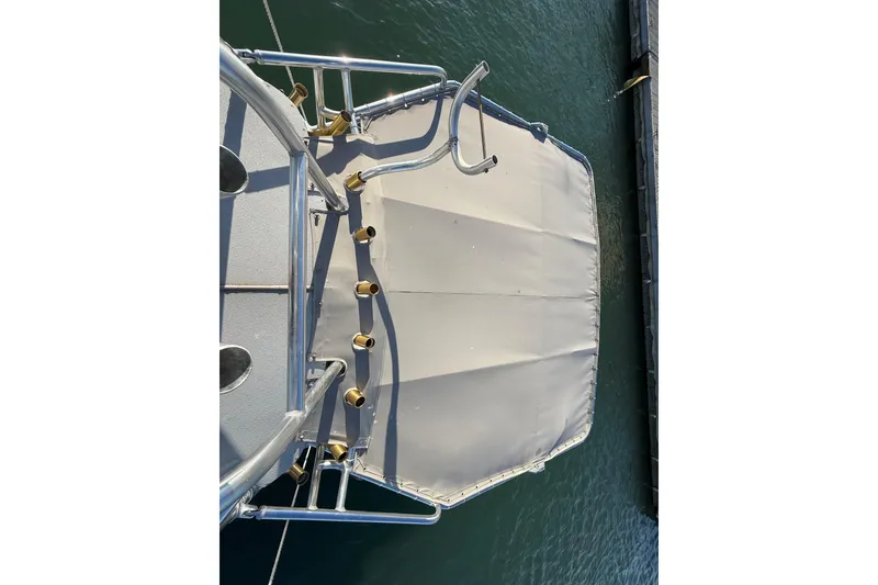 Slide: The Image of Overhead view of 1988 Stuart Angler 32 boat deck with rod holders. - 18