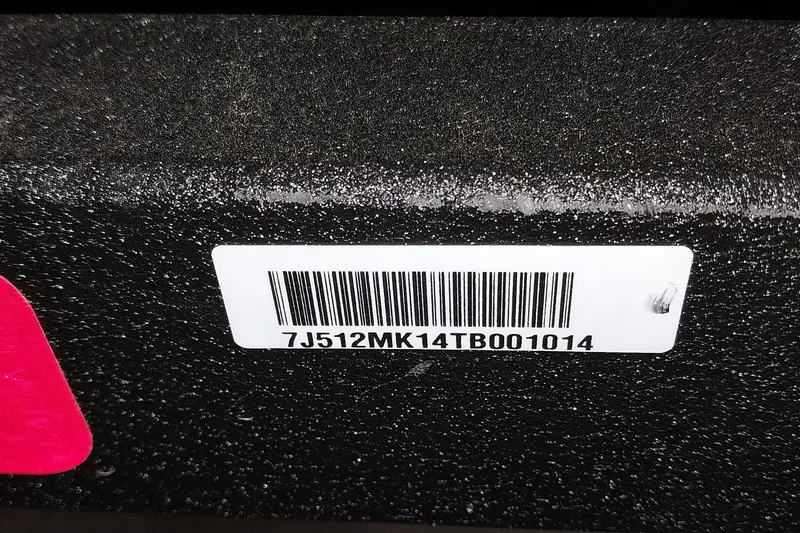 Slide: The Image of Barcode label on 2024 Ranger RT198P boat surface. - 2