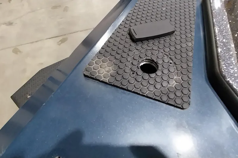 Slide: The Image of 2024 Ranger RT198P boat deck with hexagonal grip mat and mounting hole. - 25