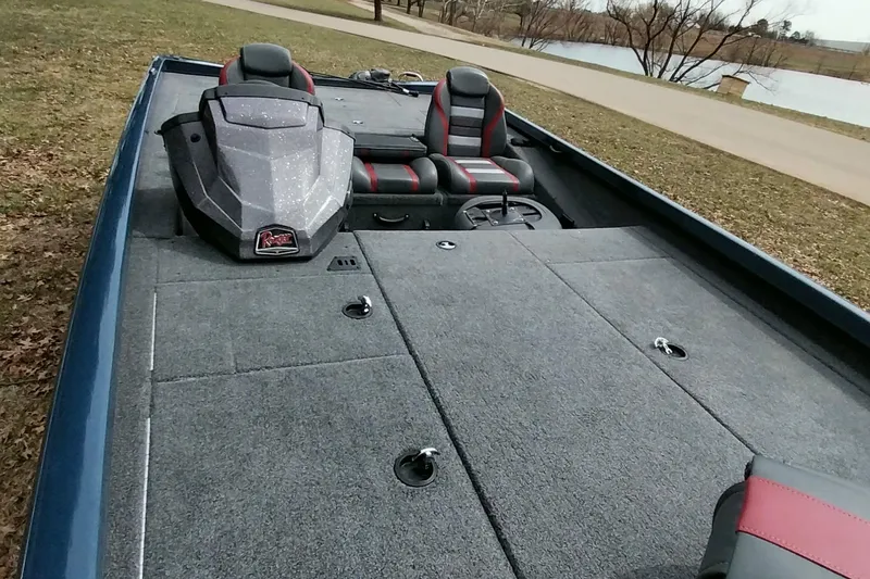 Slide: The Image of 2024 Ranger RT198P fishing boat interior with spacious deck and seating. - 37