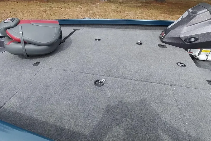 Slide: The Image of 2024 Ranger RT198P boat deck with gray carpet and seating. - 41