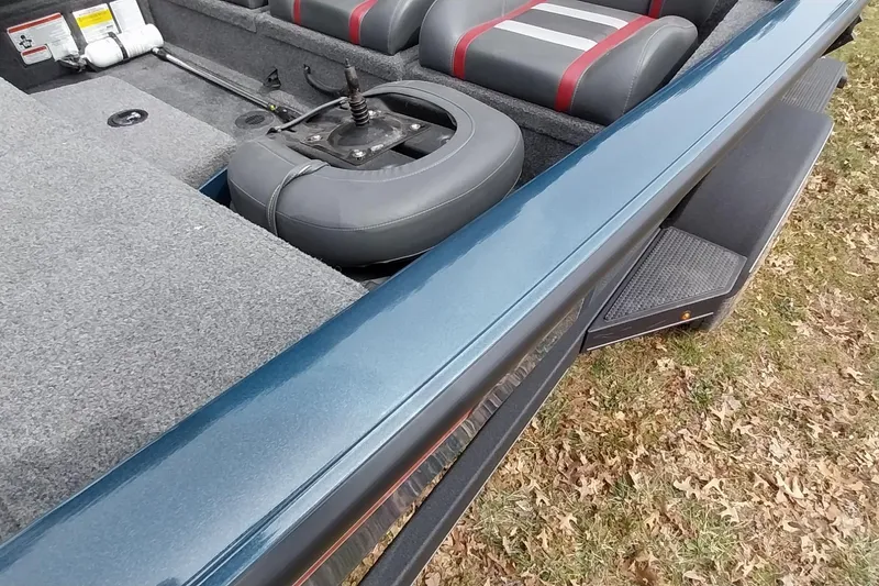 Slide: The Image of 2024 Ranger RT198P boat interior with seating and storage compartments. - 45